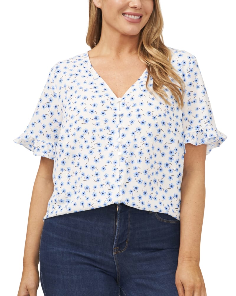 Front of a model wearing a size 1X Anika Button Loop Frill Sleeve Top in BROOKEDITSYSE by CeCe. | dia_product_style_image_id:263890